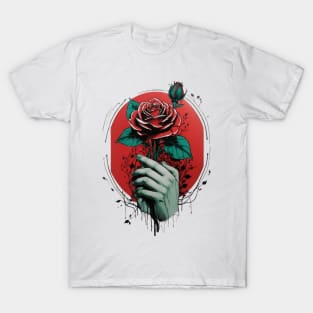 hand holding a red rose with green leaves T-Shirt